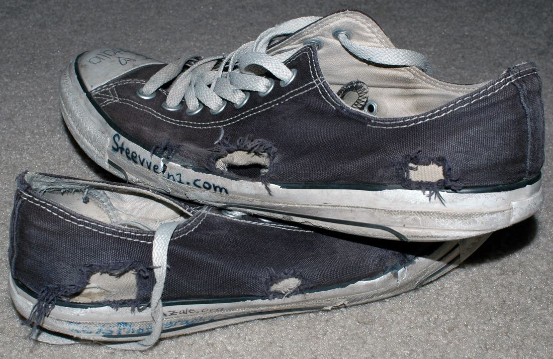 A well-worn pair of Chuck Taylor All Star sneakers